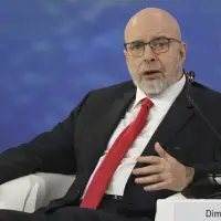 Former 2016 Trump campaign adviser is charged over his work for sanctioned Russian TV