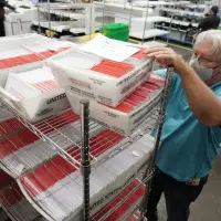 Rain, humidity have sealed some mail-in ballot return envelopes shut, elections officials say