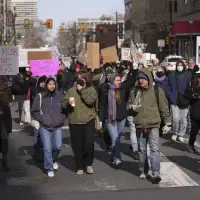 Thousands protest Trump administration policies in cities across the US