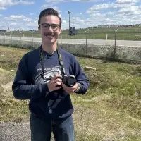 'Elbows up': Plane spotters and protesters mark the arrival of G7 leaders in Calgary