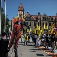 Scattering of protesters, empty sites, on second and final day of G7 leaders summit
