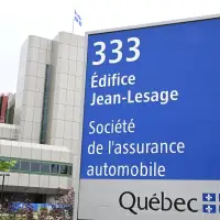 Quebec government reassigns head of auto insurance board amid scandal