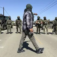Protesters and federal agents clash during raid at Southern California farm