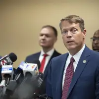 Wife of embattled Louisiana police chief charged in immigration visa fraud scheme also arrested