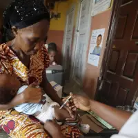 Health advocates urge Carney not to delay pledge for UN Global Fund fighting AIDS, TB