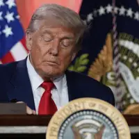 The Latest: Trump visiting Federal Reserve as feud with its chair continues