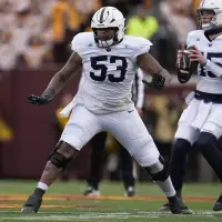 Trump signs order to clarify college athletes' employment status amid NIL chaos