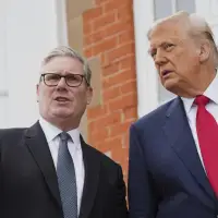 The Latest: Trump calls for more Gaza aid during meeting with UK's prime minister