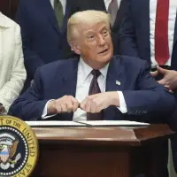The Latest: US stock market and global trade partners react to Trump's new tariffs