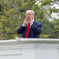 Trump takes an unexpected walk on the White House roof to survey new projects