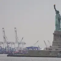 Trump's new tariffs go into effect as US economy shows signs of strain