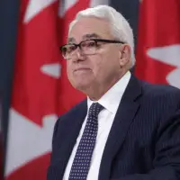Canada’s official languages commissioner says he’s worried budget cuts will threaten language rights in federal public service