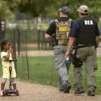 The Latest: Federal agents will patrol Washington 24/7