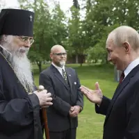 Orthodox archbishop apologizes to anyone pained by his meeting with Putin