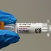 Alberta government to cover COVID-19 shots for health-care workers in policy reversal