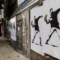 Man who hurled sandwich at federal agent pleads not guilty to assault charge