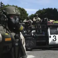 California lawmakers pass bill barring authorities from wearing face masks