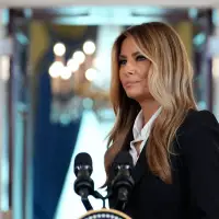 Author Michael Wolff sues Melania Trump, saying she threatened $1B suit over Epstein-related claims