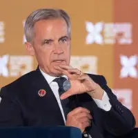 Carney tries to reassure Canadians after Trump threatens 10% tariff hike