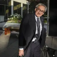 Head of public service says programs, staff will be cut as government seeks savings