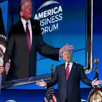 President Donald Trump, in Miami, brags about the economy despite an election-night rebuke