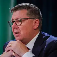 Moe says province will do what it can for village dealing with cult aftermath