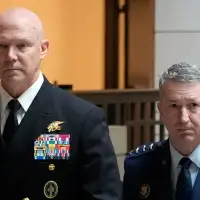 The Latest: Admiral says there was no 'kill them all' order in boat attack