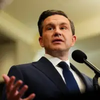 A majority government built with floor-crossers is not legitimate, Poilievre says