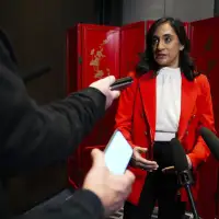 China's top diplomat hails new relations with Canada amid "complex" global changes