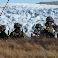 Denmark puts more troops into Greenland, raising the stakes for Trump