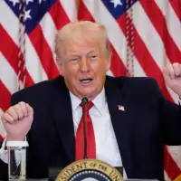 Trump says he may punish countries with tariffs if they don’t back the US controlling Greenland