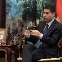 Chinese envoy says PM's claim that Beijing agreed to visa-free entry not yet official