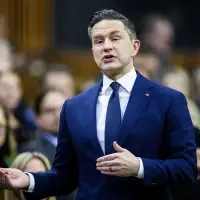Poilievre pledges co-operation, calls for action from Liberals as Parliament returns