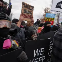 Police arrest protesters at Minneapolis federal building on 1-month anniversary of woman's death