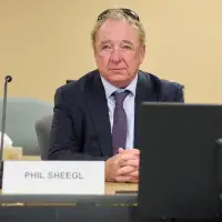 Former Winnipeg bureaucrat grilled over meetings, emails with contract bidder