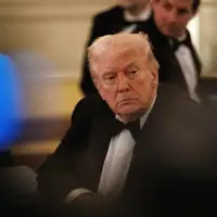 The Latest: Trump says he'll raise tariffs to 15% after Supreme Court ruling