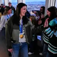 The victory lap for America's Olympic hockey champions quietly shed politics from the celebration