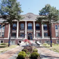 An Arkansas man accused of killing his daughter's alleged abuser wins GOP sheriff's nomination