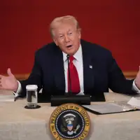 Dealing with Iran war is 'easy,' Trump says. College athlete pay? Not so much