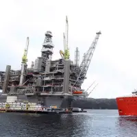 Credit agency says surging global oil prices will help N.L.'s bottom line