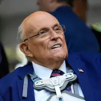 Rudy Giuliani is breathing on his own while hospitalized with pneumonia, spokesperson says