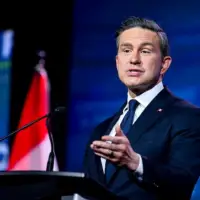 Poilievre tells Conservatives he will stay on and 'keep fighting' after Carney secures majority