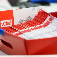 Judge refuses to block Trump order to limit mail voting. There's no immediate effect on the midterms