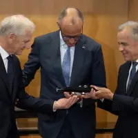 NATO leaders promise billions in spending as Canada talks up submarine deal