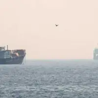 Iran says it hit vessel in Strait of Hormuz, declares route closed; U.S. announces retaliatory strikes