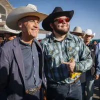 'It's looking good': Carney chats pipelines while mingling at Calgary Stampede