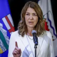 Alberta's Smith takes questions at less rowdy AI town hall, NDP calls for freeze