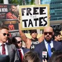 Shackled Tate brothers testify in bid to get out of jail, but judge delays decision