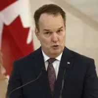 Transport minister won’t guarantee prices won’t go up after airport privatization, promises fees will be ‘partially regulated’