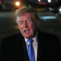 The Latest: Trump administration lowers fuel economy standards